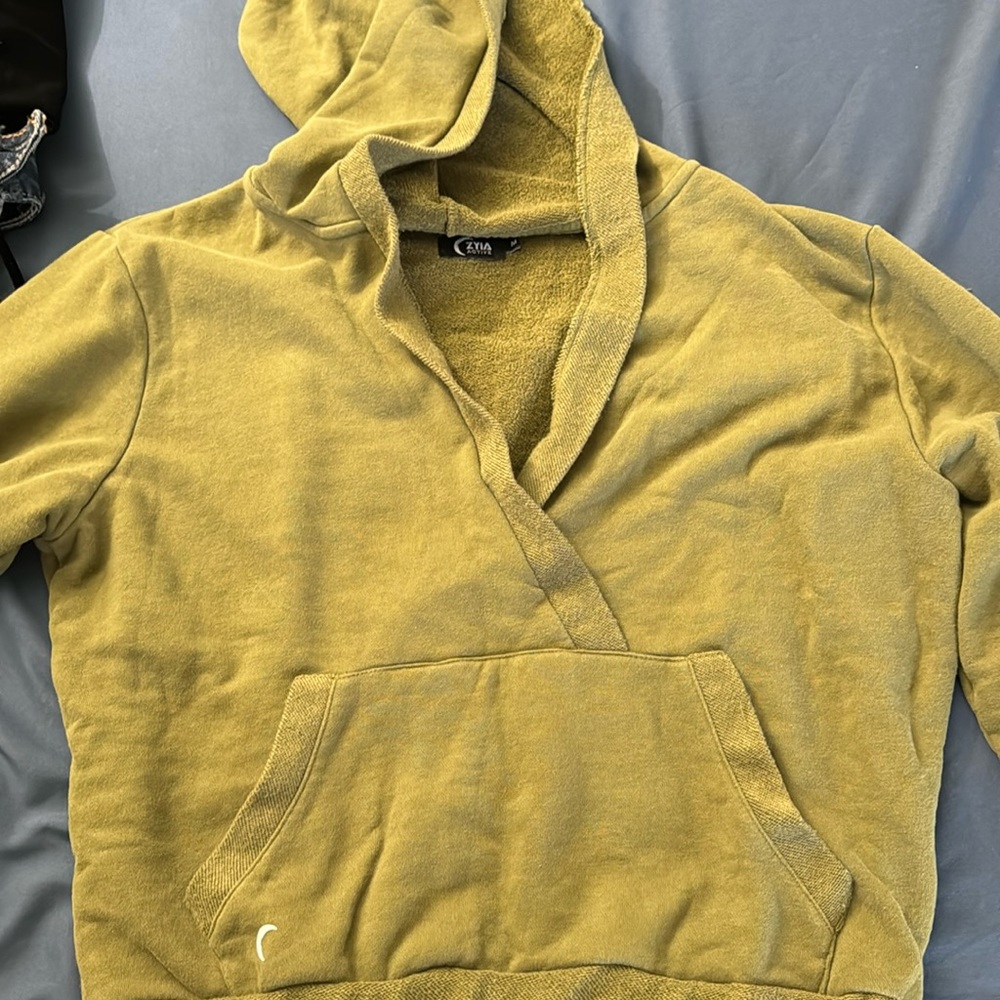 Camo green, cropped Zyia hoodie.